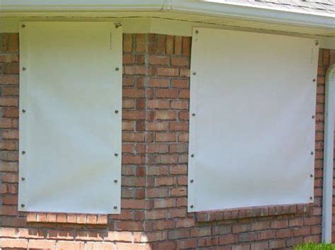 metal house tarp for hurricane|fabric hurricane shutters for windows.